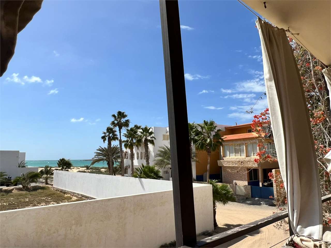 Bright Two-Bedroom Apartment with Sea View Steps from the Beach
